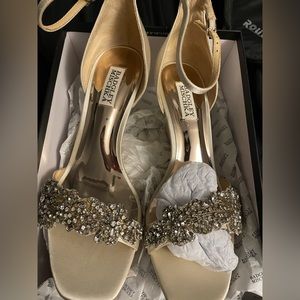 Off white / cream satin heels size 8.5 these would fit someone wear a 7.5 or a 8